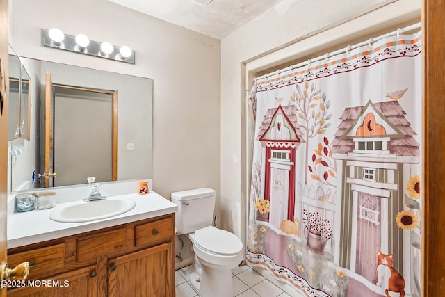 full bathroom with vanity, toilet, a shower with curtain, and tile patterned flooring