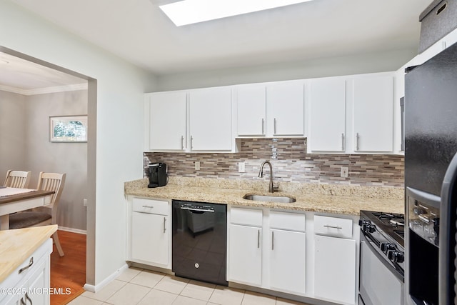 204 Begonia Ct, Jackson, NJ 08527 - kitchen featuring white cabinetry, black appliances, decorative backsplash, and a sink