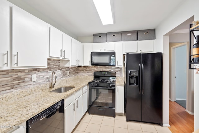 204 Begonia Ct, Jackson, NJ 08527 - kitchen featuring white cabinets, backsplash, a sink, and black appliances