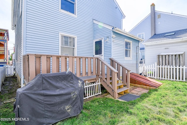 rear view of property with a deck