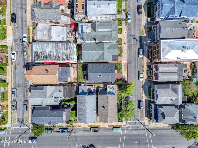 aerial perspective of suburban area with property parcel outlined