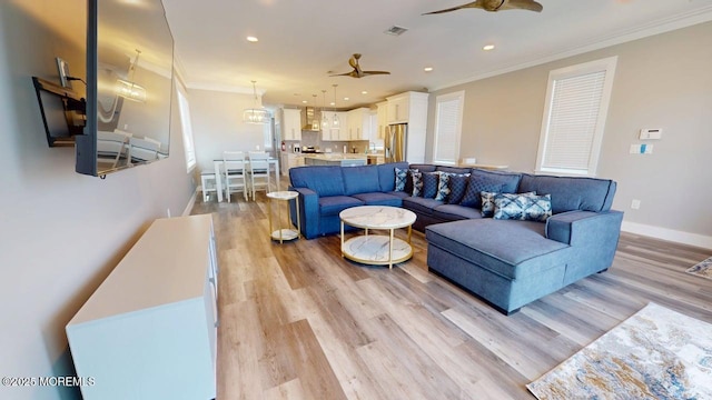 303 Webster Ave, Seaside Heights, NJ 08751 - living area with crown molding, a ceiling fan, light wood-type flooring, recessed lighting, and baseboards