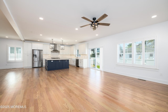 128 Church St, Keyport, NJ 07735 - unfurnished living room featuring ceiling fan, light wood-type flooring, and recessed lighting