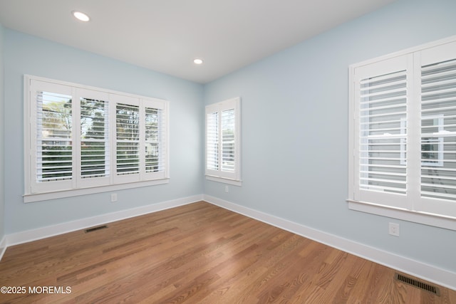 128 Church St, Keyport, NJ 07735 - unfurnished room featuring wood finished floors and recessed lighting