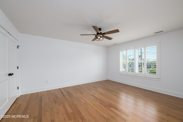 128 Church St, Keyport, NJ 07735 - unfurnished room with ceiling fan and wood finished floors