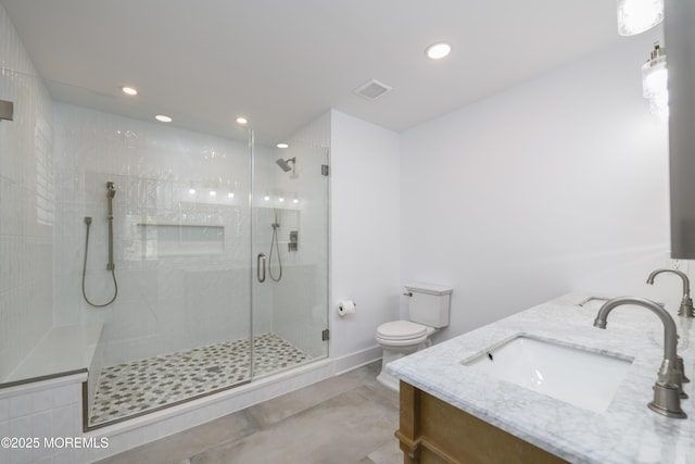 128 Church St, Keyport, NJ 07735 - full bathroom with double vanity, a shower stall, and recessed lighting