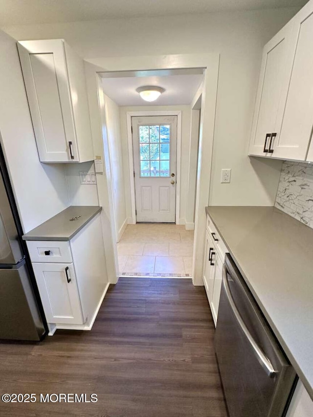 267 State Route 36, Hazlet, NJ 07730 - interior space featuring white cabinetry, dishwasher, dark wood-style floors, and refrigerator