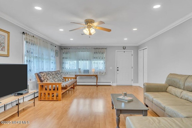 living area with crown molding, a ceiling fan, light wood-style floors, and a baseboard radiator
