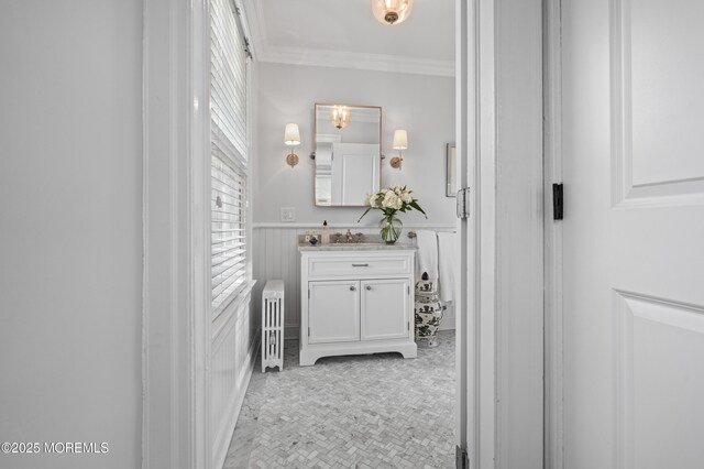 104 Lake Dr, Allenhurst, NJ 07711 - bathroom with crown molding, vanity, a decorative wall, radiator heating unit, and a wainscoted wall