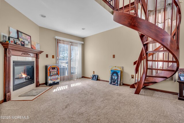 1915 Red Cedar St, Toms River, NJ 08753 - unfurnished living room with baseboards, carpet flooring, stairway, and a fireplace