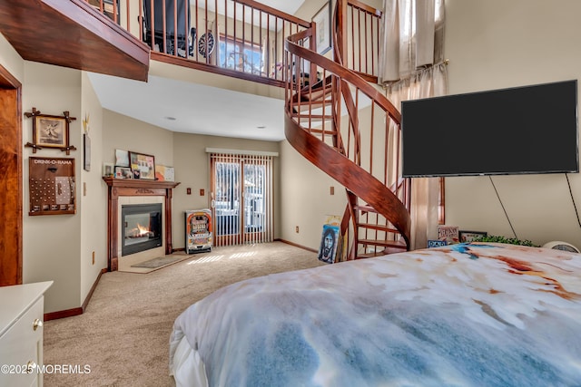 1915 Red Cedar St, Toms River, NJ 08753 - bedroom featuring a glass covered fireplace, carpet flooring, and baseboards