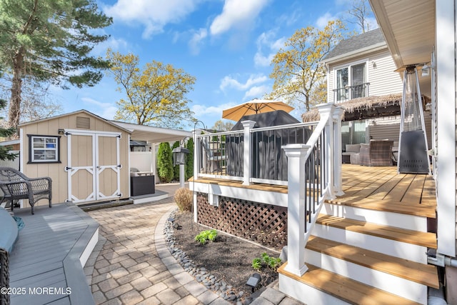 1915 Red Cedar St, Toms River, NJ 08753 - wooden deck with an outdoor structure and a storage unit