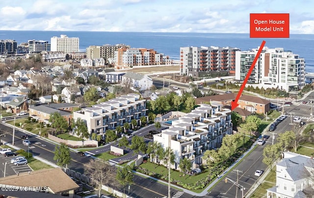 345 2nd Ave Unit 13, Long Branch, NJ 07740 - aerial view of property and surrounding area featuring a large body of water, nearby urban area, and apartment complex / building
