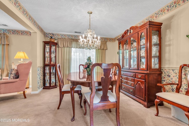 44 Sacramento Way, Tinton Falls, NJ 07712 - dining room featuring light carpet, a chandelier, and a textured ceiling