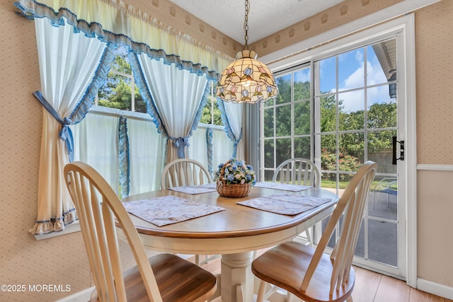 44 Sacramento Way, Tinton Falls, NJ 07712 - dining area with wallpapered walls and light wood-style flooring