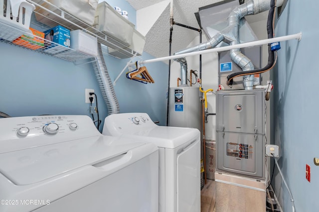 44 Sacramento Way, Tinton Falls, NJ 07712 - washroom with washer and clothes dryer, wood finished floors, and heating unit