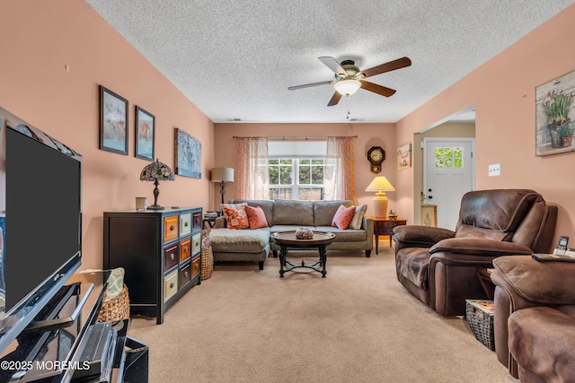 44 Sacramento Way, Tinton Falls, NJ 07712 - living area with ceiling fan, a textured ceiling, and light colored carpet