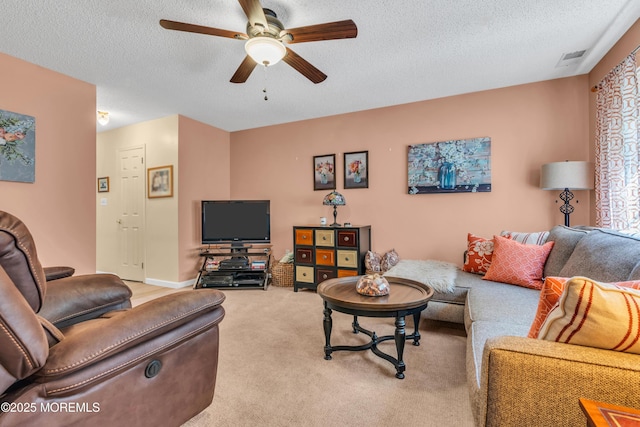 44 Sacramento Way, Tinton Falls, NJ 07712 - living room with a ceiling fan, a textured ceiling, and carpet
