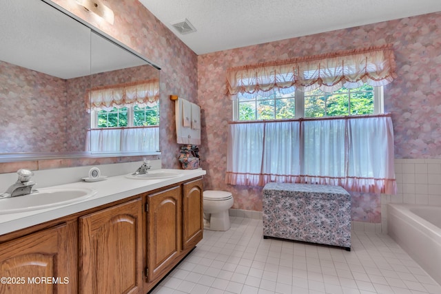 44 Sacramento Way, Tinton Falls, NJ 07712 - full bath with wallpapered walls, plenty of natural light, tile patterned flooring, and a textured ceiling