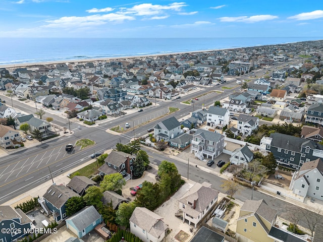 aerial view with a residential view and a water view