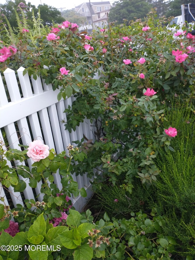 exterior details featuring fence