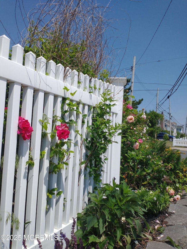exterior details featuring fence