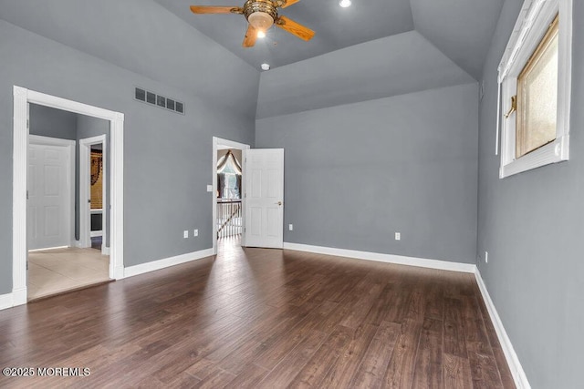 interior space featuring a wealth of natural light, ceiling fan, wood finished floors, and visible vents