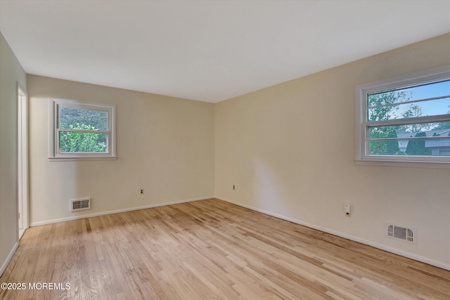 159 Koster Dr, Freehold, NJ 07728 - unfurnished room with light wood-style flooring and baseboards