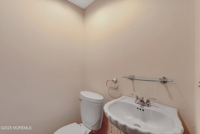159 Koster Dr, Freehold, NJ 07728 - half bathroom with a sink and toilet
