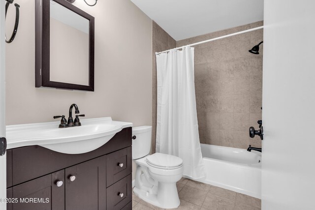 full bath featuring shower / tub combo with curtain, toilet, vanity, and tile patterned floors