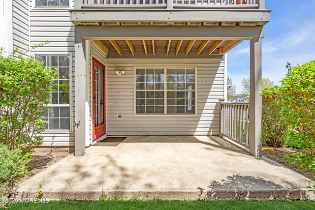 view of patio / terrace with a balcony