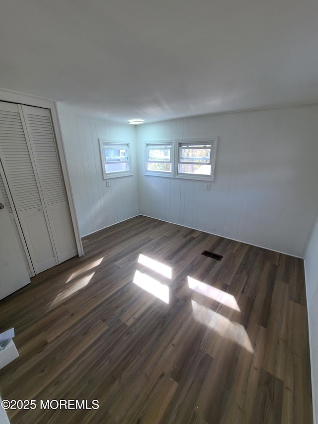 28 Alissa Ter, Jackson, NJ 08527 - unfurnished bedroom with a closet and dark wood finished floors