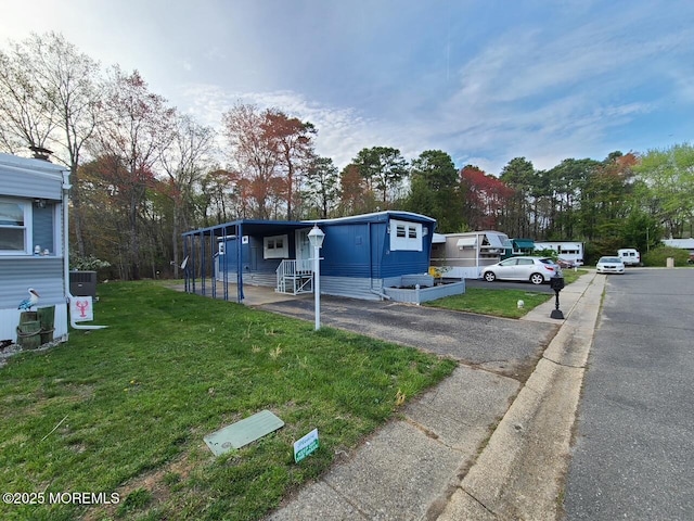 28 Alissa Ter, Jackson, NJ 08527 - view of front of home featuring central air condition unit and a front lawn