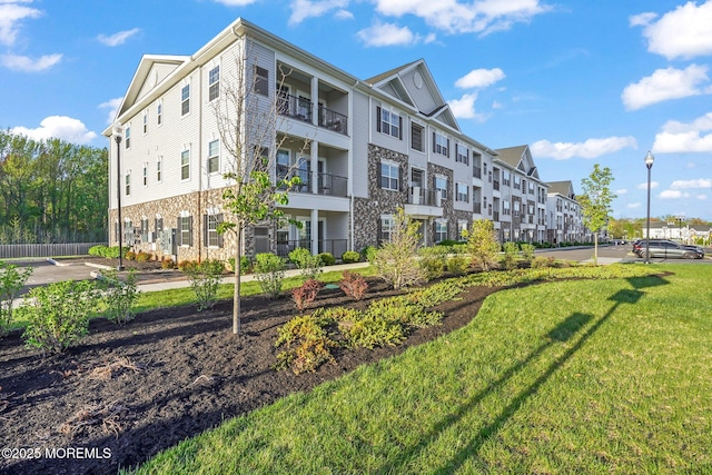 surrounding community with a yard