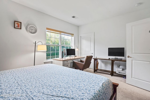 bedroom featuring carpet and visible vents