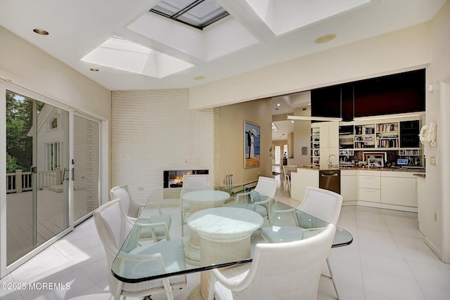 44 Nikki Ct, Morganville, NJ 07751 - dining area featuring light tile patterned floors, recessed lighting, a skylight, and a fireplace