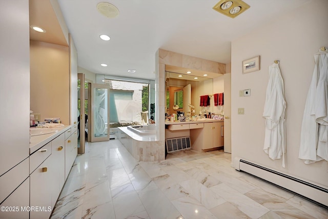 44 Nikki Ct, Morganville, NJ 07751 - bathroom featuring a baseboard radiator, two vanities, recessed lighting, a bath, and marble finish floor