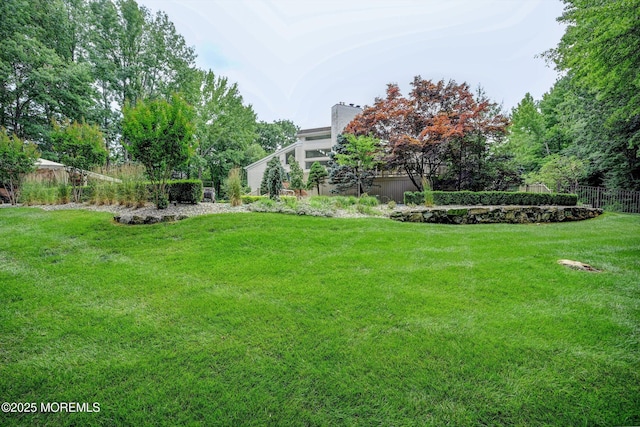 44 Nikki Ct, Morganville, NJ 07751 - view of yard featuring fence