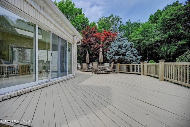 44 Nikki Ct, Morganville, NJ 07751 - wooden deck with outdoor dining space