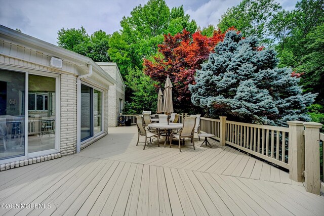 44 Nikki Ct, Morganville, NJ 07751 - wooden terrace featuring outdoor dining area