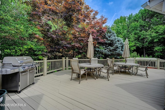 44 Nikki Ct, Morganville, NJ 07751 - wooden terrace with area for grilling and outdoor dining space