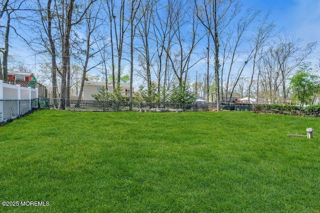 view of yard with fence