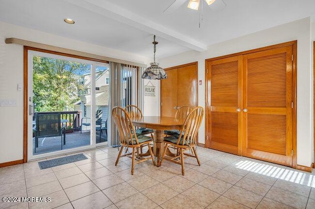 dining room featuring baseboards, beam ceiling, a ceiling fan, and light tile patterned flooring