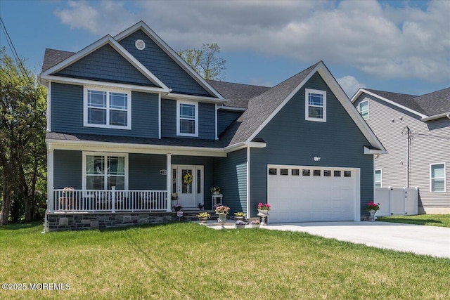 136 Lilac Dr, Brick, NJ 08724 - craftsman-style house featuring a shingled roof, concrete driveway, a porch, and a front yard