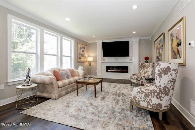 136 Lilac Dr, Brick, NJ 08724 - living room featuring crown molding, baseboards, wood finished floors, and visible vents