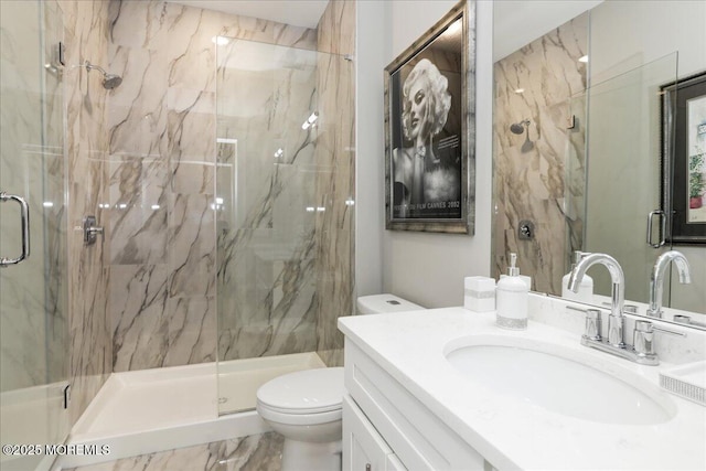 136 Lilac Dr, Brick, NJ 08724 - bathroom featuring vanity, a marble finish shower, and toilet