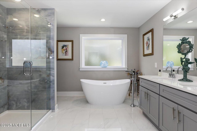 136 Lilac Dr, Brick, NJ 08724 - bathroom with a freestanding tub, a stall shower, a sink, marble finish floor, and recessed lighting