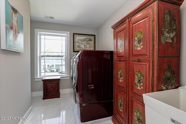 136 Lilac Dr, Brick, NJ 08724 - laundry area with visible vents, marble finish floor, baseboards, washer and clothes dryer, and cabinet space