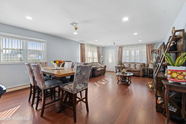 dining area with baseboard heating, visible vents, recessed lighting, and dark wood finished floors