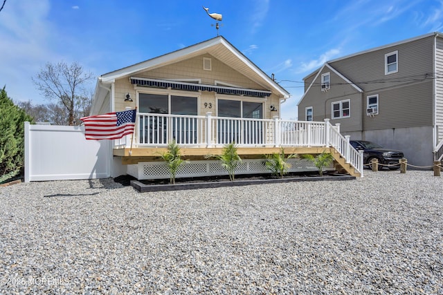 view of front of property featuring a wooden deck